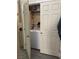 Laundry area with a washing machine, accessible through a closet at 807 Zinnia Cir, Henderson, NV 89015