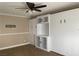 Bedroom featuring a ceiling fan and a built-in Murphy bed with ample cabinet space at 8212 Cabin Springs Ave, Las Vegas, NV 89131