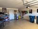 Spacious garage with ample storage solutions and organized shelving at 9204 Gentle Cascade Ave, Las Vegas, NV 89178