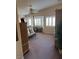 Spacious main bedroom featuring large windows with plantation shutters and generous closet space at 9204 Gentle Cascade Ave, Las Vegas, NV 89178