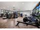 Modern gym featuring various exercise machines, weights, and mirrored walls at 10026 Honey Rose Ave, Las Vegas, NV 89143