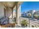 Charming balcony with outdoor seating and view of the neighborhood at 10393 Rose Palisade St, Las Vegas, NV 89141