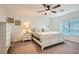 Comfortable bedroom featuring a spacious bed, dresser, and nightstand with stylish decor creating a relaxing atmosphere at 10393 Rose Palisade St, Las Vegas, NV 89141