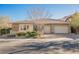 Charming single-story home with a two-car garage, mature landscaping, and a well-maintained front yard at 10507 Bryn Haven Ave, Las Vegas, NV 89135