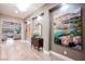 Bright hallway with hardwood floors and recessed art niches at 10507 Bryn Haven Ave, Las Vegas, NV 89135