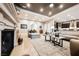 Bright and airy living room with fireplace, hardwood flooring, and open access to other living spaces at 10507 Bryn Haven Ave, Las Vegas, NV 89135
