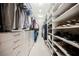 Well-organized walk-in closet with custom shelving and drawer systems to maximize storage space at 10507 Bryn Haven Ave, Las Vegas, NV 89135