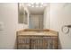Elegant bathroom featuring granite countertops and a modern vanity cabinet at 10550 W Alexander Rd # 2057, Las Vegas, NV 89129