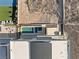 An aerial view shows a modern home with a large pool and spa at 1057 Giovanni Ln, Henderson, NV 89012