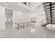 Bright open foyer featuring tile flooring, modern staircase, and an open concept design at 1057 Giovanni Ln, Henderson, NV 89012