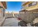 Enclosed backyard featuring a concrete area ideal for outdoor activities and relaxation at 1228 Mews Ln, Las Vegas, NV 89101