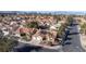 Beautiful home with desert landscaping, tile roof, and three car garage with city views at 1270 Del Lilly Ln, Las Vegas, NV 89123