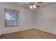 Bedroom features neutral walls, carpeted floors, and natural light from the window at 1270 Del Lilly Ln, Las Vegas, NV 89123