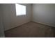 Bedroom with neutral carpet and a bright window at 1286 Horizon Village Ave, Las Vegas, NV 89183