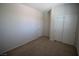Bedroom with carpet, a storage closet, and a door at 1286 Horizon Village Ave, Las Vegas, NV 89183