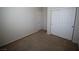 Bedroom with carpet, a storage closet, and a door at 1286 Horizon Village Ave, Las Vegas, NV 89183