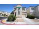 Charming two-story home with a two-car garage and desert landscaping at 1286 Horizon Village Ave, Las Vegas, NV 89183