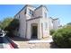 Inviting home features a covered porch and well-maintained desert landscaping at 1286 Horizon Village Ave, Las Vegas, NV 89183