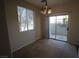 Bright and airy living room with a sliding glass door leading to a private patio at 1286 Horizon Village Ave, Las Vegas, NV 89183
