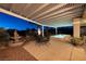 Relaxing backyard featuring a covered patio, water feature and pristine pool at 1657 Hartley Ave, Henderson, NV 89052