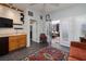 Entertainer's dream - living room area with bar, TV, and easy access to outside patio at 1657 Hartley Ave, Henderson, NV 89052
