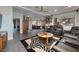 Spacious living area showcasing leather furniture and a unique zebra-print rug at 1657 Hartley Ave, Henderson, NV 89052