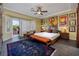 Comfortable main bedroom with an outside view and unique décor at 1657 Hartley Ave, Henderson, NV 89052