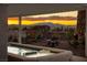 Backyard pool and spa with desert landscaping and panoramic mountain views at 1657 Hartley Ave, Henderson, NV 89052