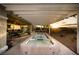 Backyard oasis with a sparkling pool, desert landscaping, and a covered patio at 1657 Hartley Ave, Henderson, NV 89052