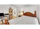 The bedroom features a wood bed frame, wood flooring, and an open door to the hallway at 1808 Scenic Sunrise Dr, Las Vegas, NV 89117