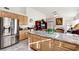 Bright kitchen boasts granite countertops, stainless steel appliances, and ample cabinet space at 1808 Scenic Sunrise Dr, Las Vegas, NV 89117