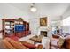 Inviting living room features a fireplace, tile floors, and stylish decor at 1808 Scenic Sunrise Dr, Las Vegas, NV 89117