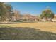 Expansive community park offers residents a place to relax and gather with covered picnic pavilion and green spaces at 186 Shaded Peak St, Henderson, NV 89012