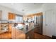 Functional kitchen featuring stainless steel refrigerator, kitchen island, and ample counter space at 186 Shaded Peak St, Henderson, NV 89012