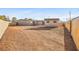 Expansive dirt backyard offering ample space for customization and outdoor activities at 19 Montana Way, Henderson, NV 89015