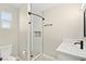 Bathroom featuring updated vanity, shower with glass surround, and modern fixtures at 19 Montana Way, Henderson, NV 89015