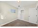 A modest bedroom features a built-in closet and ample natural light from the window at 19 Montana Way, Henderson, NV 89015