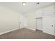 Bright bedroom featuring carpet flooring, neutral walls, and built in storage at 19 Montana Way, Henderson, NV 89015