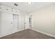 A well-lit bedroom showcases a built-in closet and access to the rest of the home at 19 Montana Way, Henderson, NV 89015
