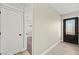 Hallway view showcasing neutral walls, doors, and flooring at 19 Montana Way, Henderson, NV 89015