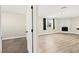 View of the living room with a fireplace and access to a bedroom at 19 Montana Way, Henderson, NV 89015