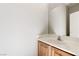 Well-lit bathroom features wooden cabinets, large mirror, and plenty of open space at 2276 Laramine River Dr, Henderson, NV 89052