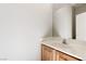 Bathroom featuring single vanity, a large mirror, and neutral color palette at 2276 Laramine River Dr, Henderson, NV 89052