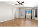 Bedroom with wood-look floors, natural light, and a ceiling fan at 2276 Laramine River Dr, Henderson, NV 89052