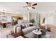 Inviting living room featuring an open layout, tile flooring, and neutral color palette at 2276 Laramine River Dr, Henderson, NV 89052