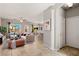 Bright living room with tile floors, large windows, and an open concept design at 2276 Laramine River Dr, Henderson, NV 89052