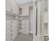 Custom walk-in closet with ample shelving and drawer space for storage at 2869 Josephine Dr, Henderson, NV 89044