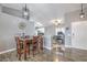 Cozy dining area featuring a wooden table set and views into the kitchen and office at 427 Mindoro Ave, North Las Vegas, NV 89031