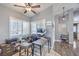 Bright and airy office space with tile floor, large windows, and a functional workspace at 427 Mindoro Ave, North Las Vegas, NV 89031