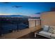 Balcony with seating area and city views at 438 Serenity Point Dr, Henderson, NV 89012